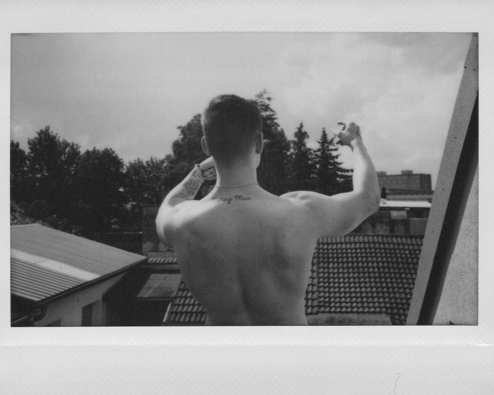 Two women on a bench, black and white