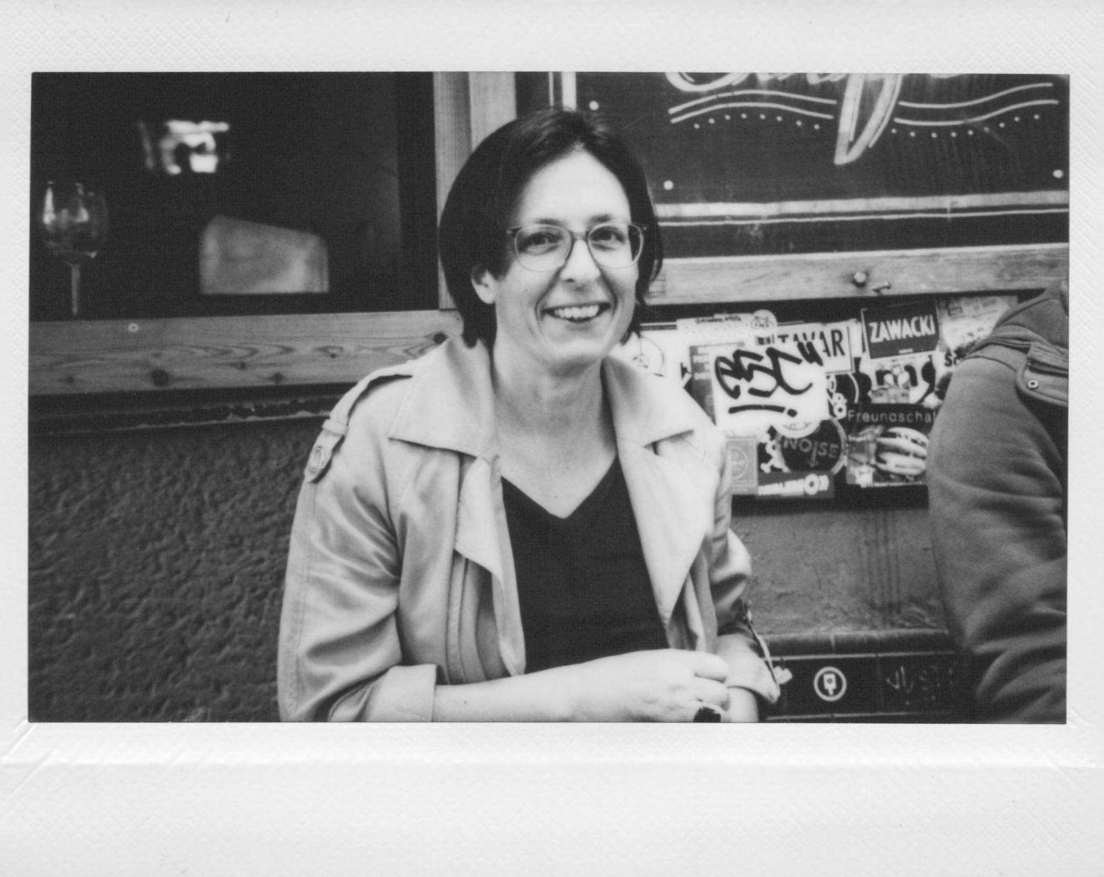 Portrait lying on sofa, black and white